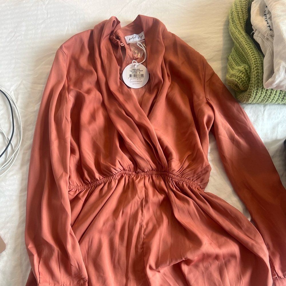 Petal and Pup never worn romper! Super cute pink color, size medium!